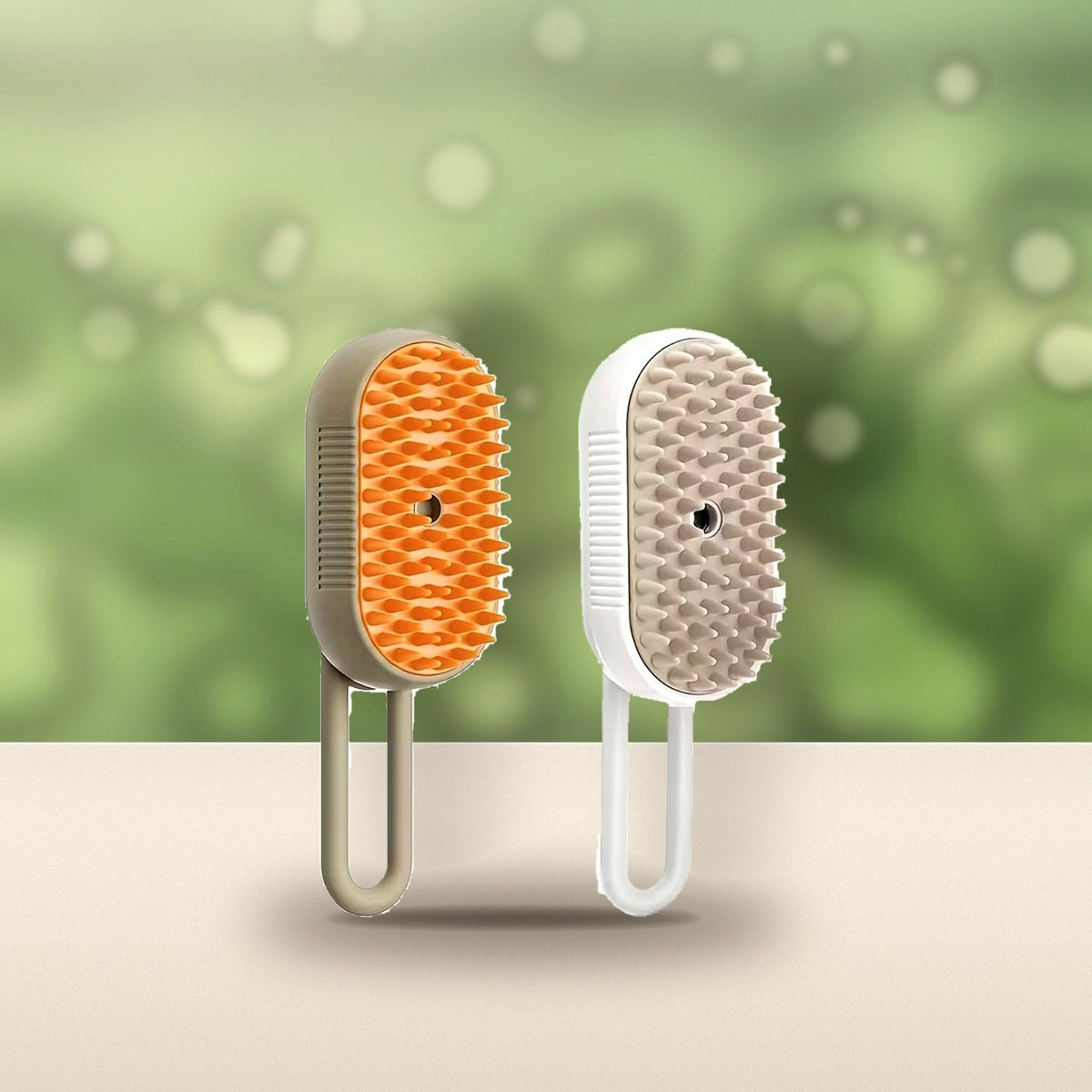 Both Steam Grooming Brush colours on a sunny garden table