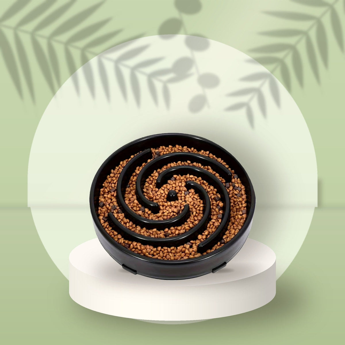 Black Spiral Slow Feeder Bowl on a sage podium