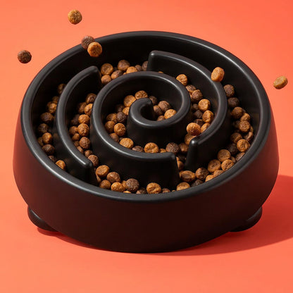 Spiral Slow Feeder Bowl on a coral backdrop